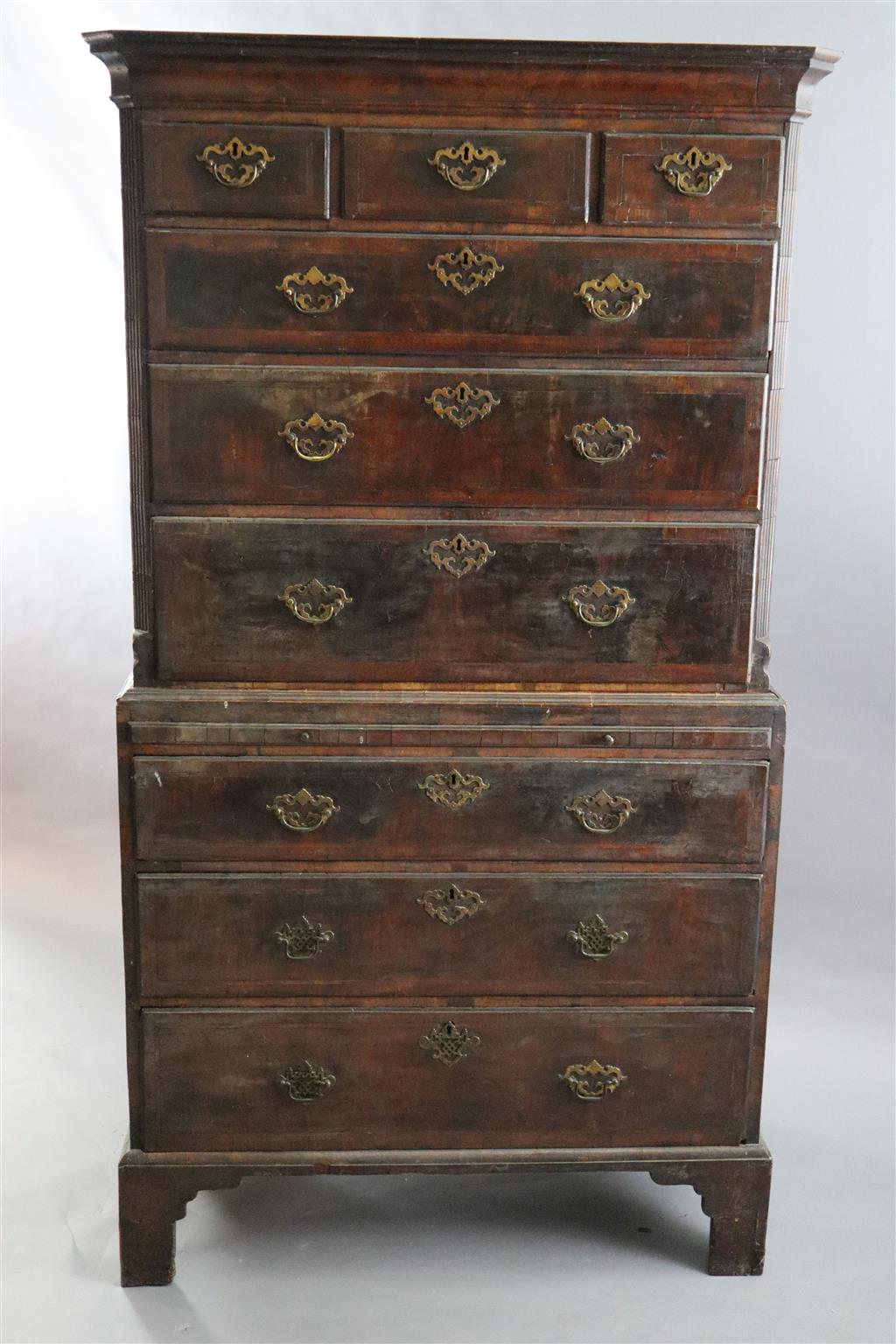 A mid 18th century featherbanded walnut chest on chest, W.3ft 6in. D.1ft 9in. H.6ft 2.5in.